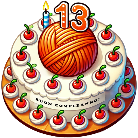 Torta di compleanno con un gomitolo commestibile, una candela ed il numero 13